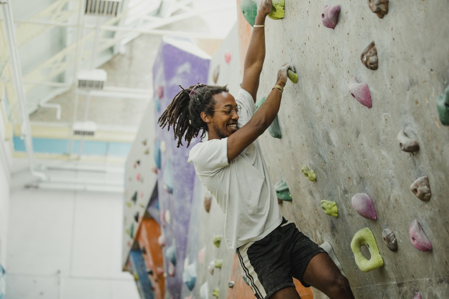 Climber on an indoor bouldering wall